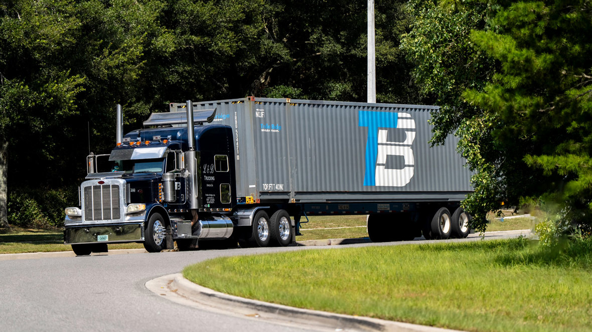 Dark Navy Truck Turning Corner Edit